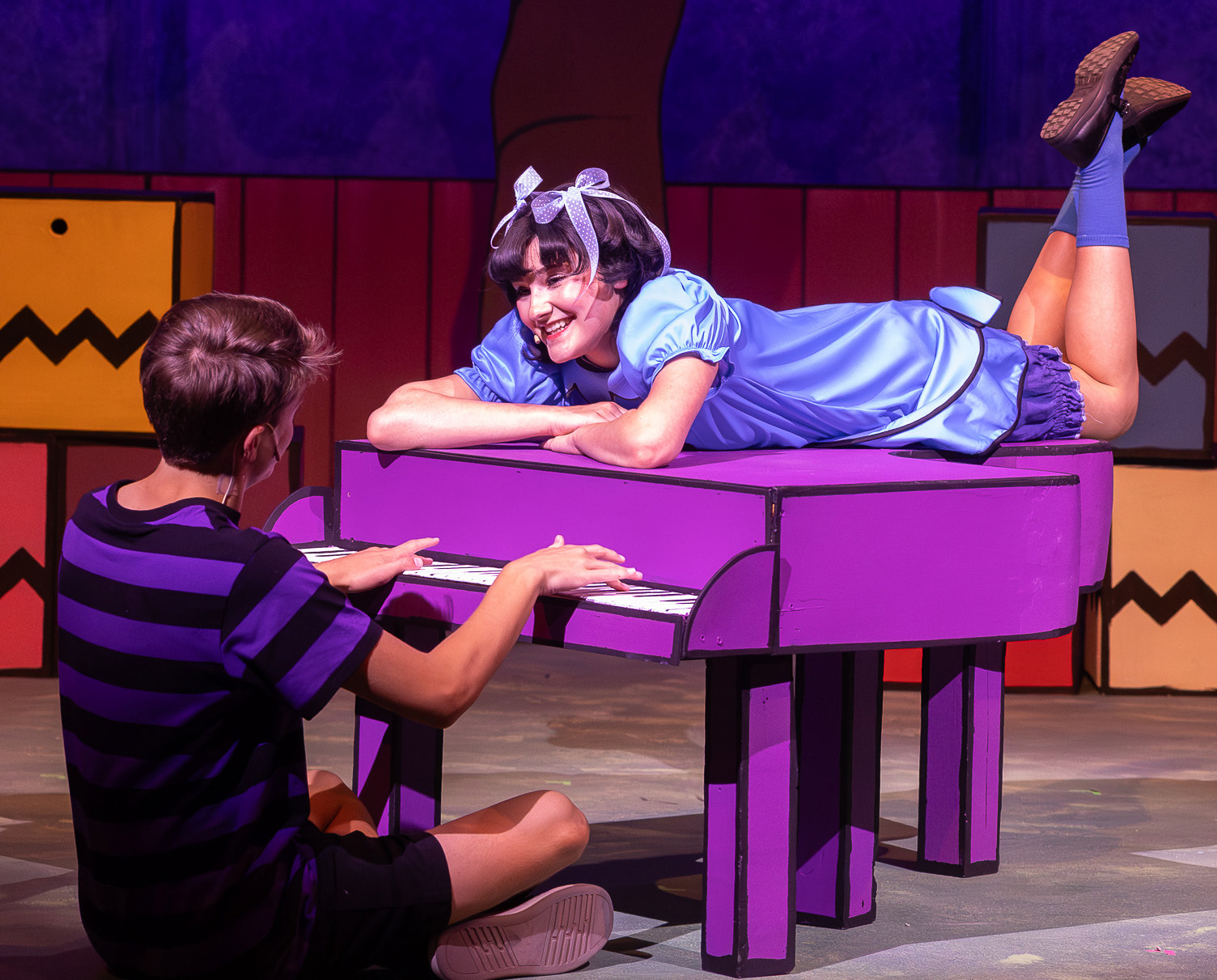 Schroeder and Lucy, portrayed by Atticus Lee and Kennedy Cardenas, embrace an intimate conversation as he performs a tune on his piano during the Amarillo Little Theatre Academy production, “You’re a Good Man, Charlie Brown.” The Wellington Ritz Theatre welcomes the production with a 2 p.m. and 7 p.m. show on Saturday, July 25. For reserved seats, $20 for adults and $12 for students (three and up), call 806-447-0090 or visit wellingtonritztheatre.com. VENICE MINCEY PHOTOGRAPHY