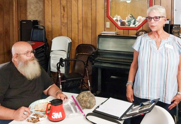 Sharon Braddock, of Cornerstone Caregiving, right, discussed aid options available to elderly individuals for help with activities of daily living. Braddock spoke at the weekly luncheon Thursday, July 24 at the Childress Senior Citizens Center. Dale Hibbs, left, was among senior citizens at the luncheon. Grace Holman