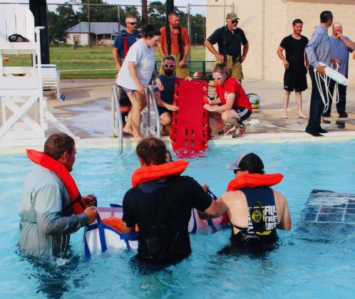 Wellington first responders, including the Wellington Volunteer Fire Department and Wellington Emergency Medical Services, collaborate with Wellington Aquatic Venue (WAV) staff for a recent water rescue training at the WAV. Cari-Anna Wynn
