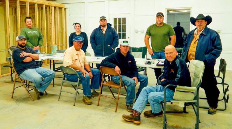The Wellington Gun Club Board of Directors, front row, from left, Matt Needham, Jason Dugan, Vice President Creed Riley, Cliff Waller, and back row, from left, Secretary Carrie Skelton, Treasurer Brook Patterson, Kenny Patterson, President Chad Skelton and Kent Riley on Thursday, March 13.