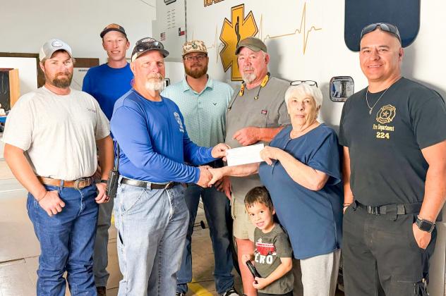 In light of the recent fires, which consumed over 2,000 acres in Hall County, Hall County Emergency Management Services (EMS) makes a recent donation to the Memphis Volunteer Fire Department. From left: Dustin Simmons, Zack Fisher, Terry Altman, Zack Altman, Jace Frances, Stratton Fisher, Lucheryl Speed, Nick Narvaez. HALL COUNTY EMS