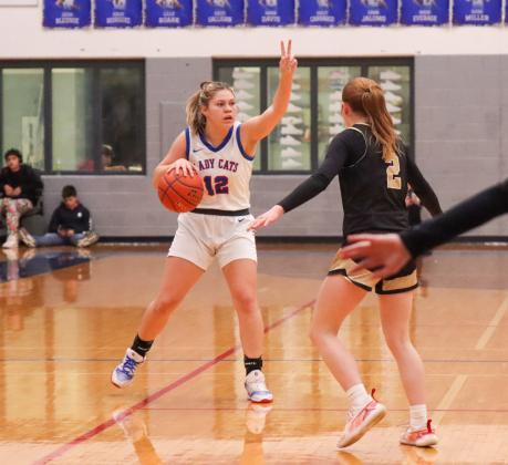 Childress’ Emma Jalomo calls a play during the Lady Cat’s 54-49 loss to the Bushland Lady Falcons Tuesday, Jan. 13 in Childress. Unable to break their losing streak, the Lady Cats also fell to the Dalhart Lady Wolves in a 65-38 heartbreak Friday, Jan. 16 in Dalhart, upping their total to eight consecutive losses. Also in a rough patch, the Childress Bobcats came up short against Dalhart in a 65-46 district opener Friday, Jan. 16, securing their fourth consecutive loss. Childress High School Yearbook