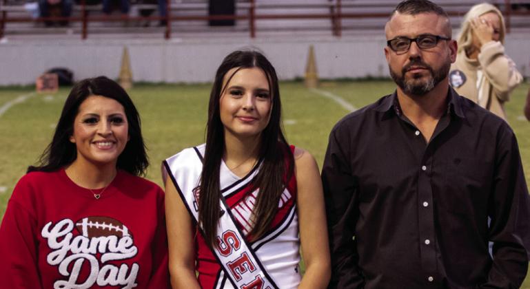 Mallory O’Rear is the daughter of Kimberly and Dusty Holland and Quentin O’Rear. She has been a member of the Rocket Regiment for four years, and she currently serves as the drum major. She has also been a varsity cheerleader for one year.