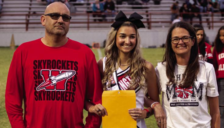 Gracie Jean Lampe is the daughter of Jason and Becky Lampe. She has been a varsity cheerleader for the Rockets for three years.