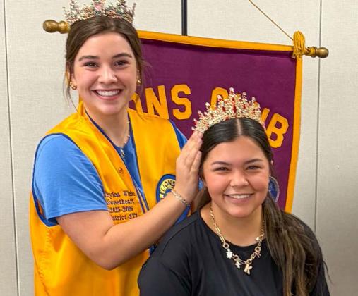 Outgoing Wellington Lions Club Sweetheart Treylea Wiebe crowns the new sweetheart, Kaycee Martinez, during the Monday, June 1 meeting. The Rocket Leo Club provided the crown. Martinez will begin her reign at the Monday, July 6 meeting. BEV ODOM/THE GREENBELT INTREPID