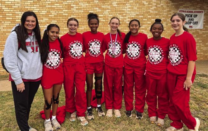 The Wellington Lady Rockets compete at the UIL Region 1 Cross Country Championships Monday, Oct. 21 at Mae Simmons Park in Lubbock. From left: Coach Savannah Henderson, Sabrina Segovia, Addalyn English, Angela Lewis, Taytum Kane, Leslie Orozco, Aleah Lewis, Anna Henard.