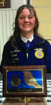 Jordyn Altman serves as the Greenbelt District Sentinel during the Greenbelt District FFA District Banquet Monday, Dec. 9.