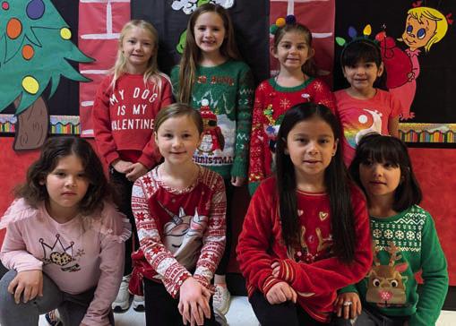Cabbell, Peters claim Wellington Elementary ugly sweater contest prizes