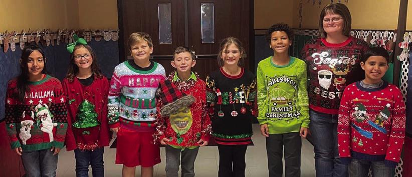 Cabbell, Peters claim Wellington Elementary ugly sweater contest prizes