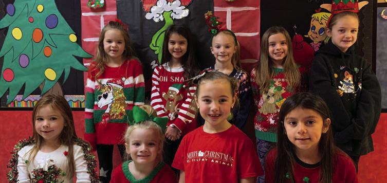 Cabbell, Peters claim Wellington Elementary ugly sweater contest prizes
