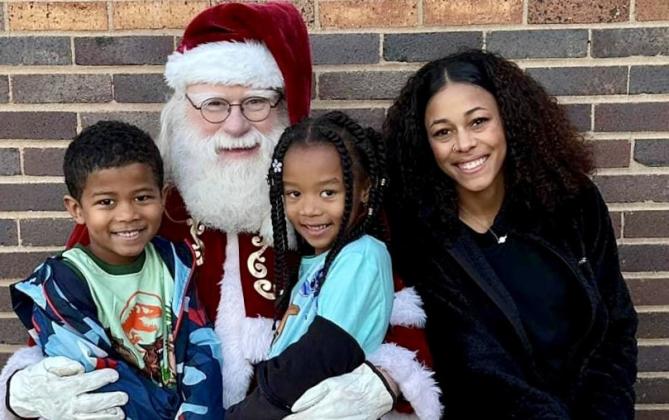 Santa, his helpers and the Grinch visit Childress Elementary