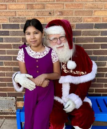 Prior to Christmas break, Santa Claus, as well as his helpers and the Grinch, visit Childress Elementary School. Photos Courtesy of Childress Elementary