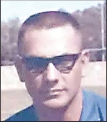 TROY J. ADAMS