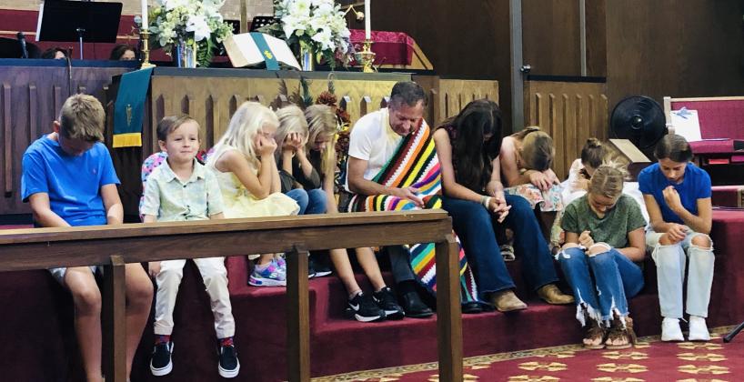 Students, backpacks receive blessing