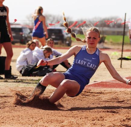 Chloe Chilton finishes fifth in long jump, recording a distance of 13-07.75 during the Rocket Relays Thursday, March 2 at Powell Field in Wellington. Through the Lens of Liz/Elizabeth Oronia
