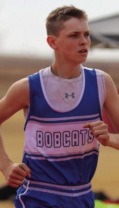 Austin Bradley competes in the 3,200-meter run during the Rocket Relays Thursday, March 2, finishing fourth with a time of 15:14.75.