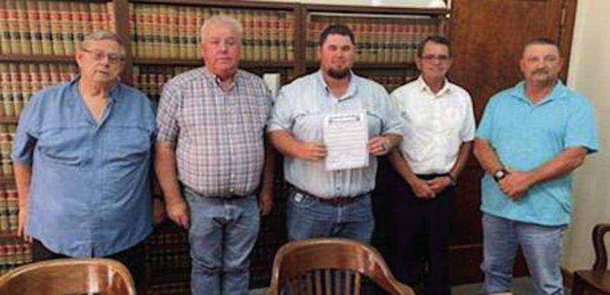 During its October meeting, the Commissioners Court of Collingsworth County signed a proclamation, recognizing the Collingsworth County 4-H program and emphasizing the incredible experiences that 4-H offers youth. From left, County Judge John James, Pct. 3 Commissioner Joel Sherwood, County Agent Kenny Patterson, Pct. 2 Commissioner James “Jim” Ellis, Pct. 1 Commissioner Farris Nation. Courtesy Photo