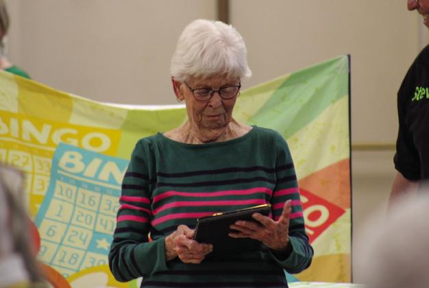 Bobbie Ariola accepts the Memphis Chamber of Commerce Lifetime Achievement Award at the 103rd Annual St. Patrick’s Day Memphis Chamber of Commerce Banquet. For additional awardees, see 2A