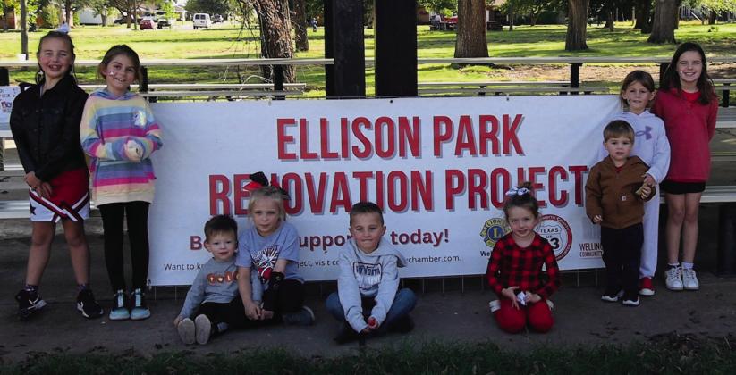 Wellington youth support the Ellison Park Renovation Project with a lemonade stand fundraiser Friday, Oct. 27. The young, community service-minded volunteers raised $461. Organizers and supporters, from left: Rafe Barlow, Jenna Faulks, Bexton Brooks, Hallie Warren, Drake Barlow, Tinlee Cabbell, Levi Faulks, Adeline Faulks, Kodi Cabbell. Photo by Neal Odom