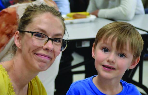 Photos Courtesy of Wellington Elementary School In honor of National Child Prevention Month, parents and guardians of Wellington Elementary School Sparklers join their children for lunch.