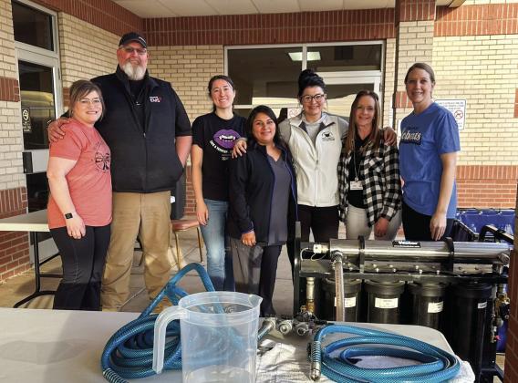 Photo Courtesy of Childress Regional Medical Center Volunteers aid at the Childress Regional Medical Center (CRMC) drinking water station, located in the ER parking lot, Monday, Feb. 27 during the recent water outage, which effected the City of Childress for over 30 hours.