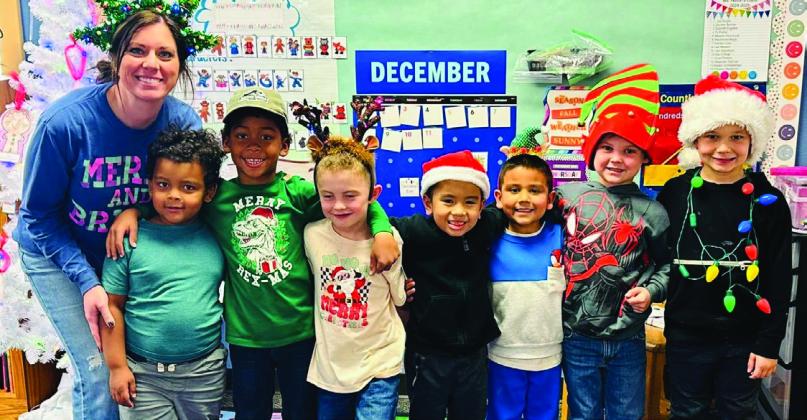 Wellington Elementary School students sport Christmas head gear