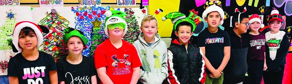 Wellington Elementary School students sport Christmas head gear