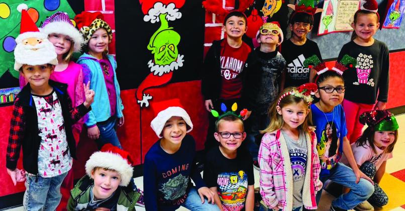 Wellington Elementary School students sport Christmas head gear