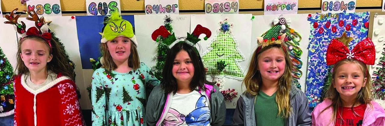 Wellington Elementary School students sport Christmas head gear