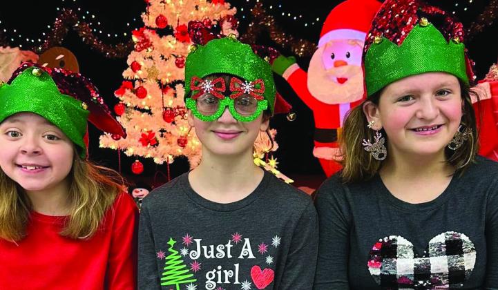 Wellington Elementary School students sport Christmas head gear