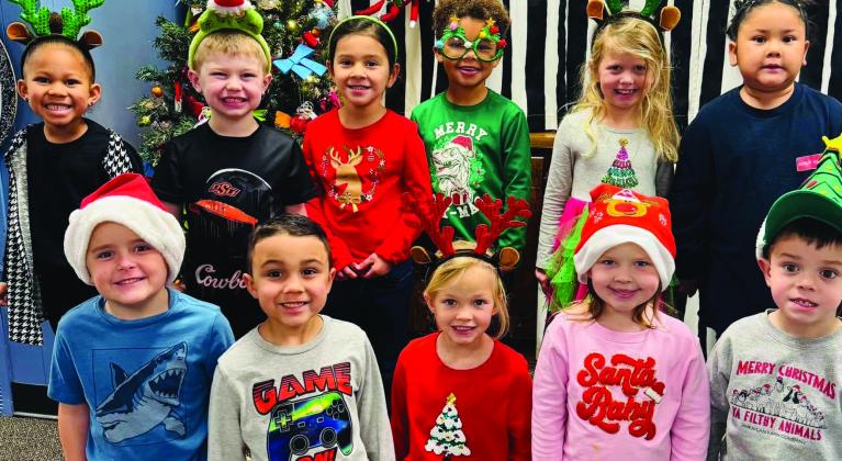 Wellington Elementary School students sport Christmas head gear