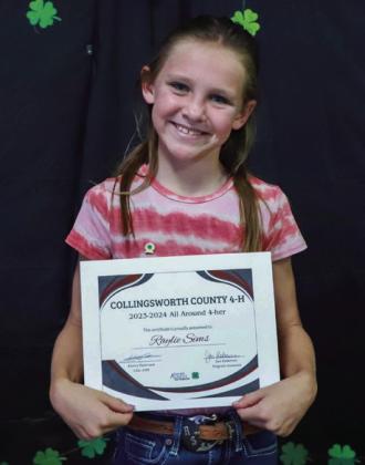 The 2023-2024 All-Around 4-Her is presented to Raylie Sims.