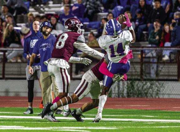 Childress wide receiver Lamont Nickleberry (14) snags a catch during the Bobcats’ 48-15 district win over Tulia Friday, Oct. 14.