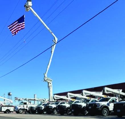 Old Glory greets Greenbelt Electric Cooperative’s membership as visitors attend the drive-thru annual meeting from 11:30 a.m.-1:30 p.m. Friday, Sept. 27. Members lined up on 9th St. to enter the ally from the north. See additional photos, page 3A.