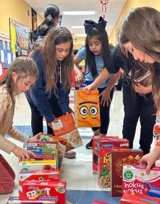 Third-grade cereal drive serves dual purpose