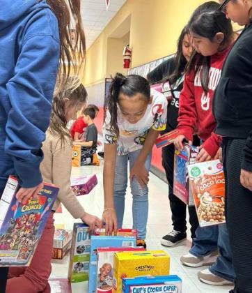 Third-grade cereal drive serves dual purpose