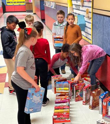 Third-grade cereal drive serves dual purpose