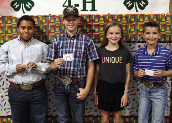 The Junior Meat Judging team of Bryson Session, left, Slade Chapman, Reagan Souder and Quay Bruce placed third at district.