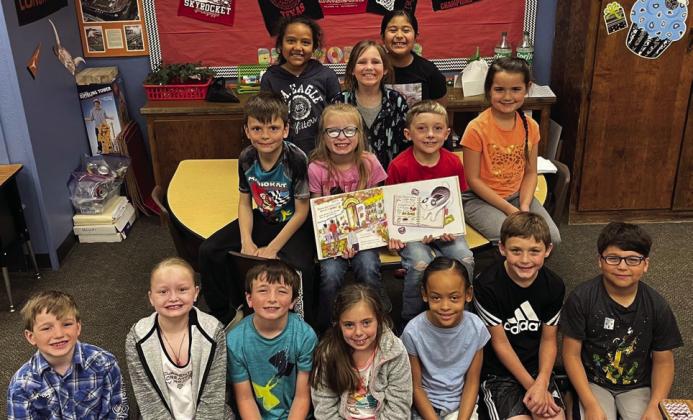Wellington Elementary School second-grade teacher Becky Lampe explained that she had the privilege of reading ‘I Love Strawberries!’ to all of the second graders. Her students include, front row, from left: Will Berry, Aubree Richard, Easton Patterson, Briley Holton, Alajea Archie, Jasper Duke, Nahim Olvera. Second row, from left: Caleb Peters, Dallas Duke, Colt Dettle, Summer Valles. Third row, from left: Sariyah Dean, Raylie Sims, Audrina Gonzales. #ReadAgBooksTX2023 takes place all over the state.