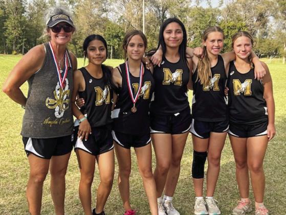 The Memphis Junior High Lady Whirlwinds compete at the UIL 2A District Meet Wednesday, Oct. 9 in Wheeler, where Elizabeth Hoffine secured a fifth-place individual finish. From left: Coach Michelle Branigan, Maria Soto, Hoffine, Ariya Garcia, Mylee Robison, Mikyela James.