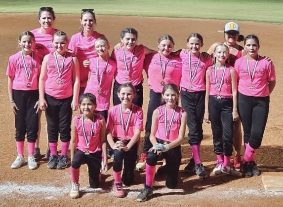 The first year for seven of the Lady Rockets to play softball, one mom described the girls as growing tremendously from game one to the last game and falling in love with the sport. Front row, from left: Juliet Solis, Raylie Sims, Peyton Roberson. Second row, from left: Blair Ward, Presley Kemp, Calleigh Henard, Quinn Roberson, Hadlee Patterson, Berkeley Ward, Cora Henard, Sara Morris. Back row, from left: Statistician Tana Roberson, Coach Molly Sims, Coach Lauren Patterson.