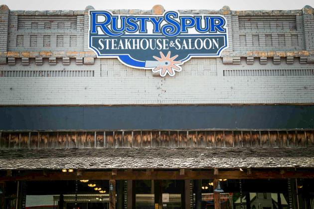 Rusty Spur Steakhouse and Saloon opens its doors to the public Tuesday, June 17, offering hand-cut certified Angus beef, a full bar, a pool table and the most anticipated amenity, a salad bar, complete with fresh vegetables daily.