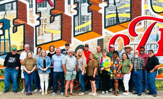 Front row, from left: DeAnna Hinson Cassabone, Lori Lacy Gillem, Jamie McKay, Richard O’Rear, Stephani Bailey Holman, Carmen Garcia Hinson, Ada Sain Patterson, Brenda Powell Brown, Becky Sanchez Hinojosa, Bob Owens, Dell Davis. Back row, from left: Jay Andes, James Benton, Deeda Seal Ackerman, Stacy Scott Crownover, Bryan Wilbur, Michael Souder, Chris Hays, Jerry Dan Davis, James Cleveland, Geronimo Molina.