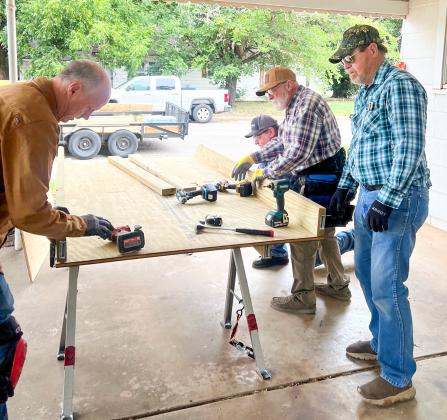 Members of Wellington Lions Club team up with local volunteers, as well as The Texas Ramp Project – Panhandle Area volunteers, of Amarillo, on Saturday morning, Sept. 6 to construct two ramps at Wellington locations.