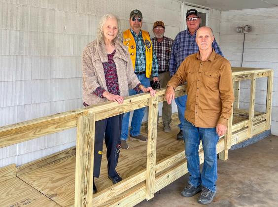 Members of Wellington Lions Club team up with local volunteers, as well as The Texas Ramp Project – Panhandle Area volunteers, of Amarillo, on Saturday morning, Sept. 6 to construct two ramps at Wellington locations.