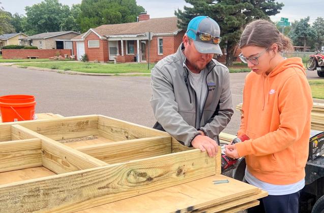 Members of Wellington Lions Club team up with local volunteers, as well as The Texas Ramp Project – Panhandle Area volunteers, of Amarillo, on Saturday morning, Sept. 6 to construct two ramps at Wellington locations.