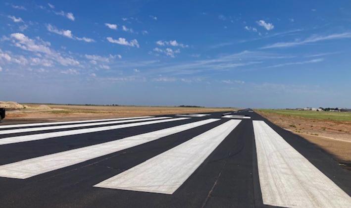 The Texas Department of Transportation (TxDOT) Aviation Capital Improvement Project is complete, featuring a partial depth reconstruction of the taxiway system, a crack seal on the runway, a 90’x90’ turnaround for large aircrafts, a widened center taxiway and new markings across the entire airfield.