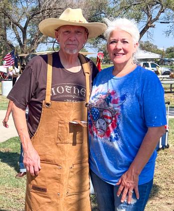Justice of the Peace Cliff Waller, left, and Justice of the Peace Court Clerk Debbie Huntress garner second place in the Living History Chili Cookoff at Powell Park. A community service project, the duo donated their proceeds to Hearts United Give Support (HUGS), the cancer support organization for Collingsworth County residents.
