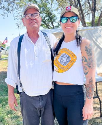 The father-daughter team of Jody Coleman, left, and Taylor Coleman earn third place in the Chili Cook Off Saturday, Oct. 4.