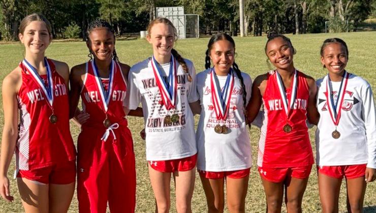 Wellington High School sophomore Taytum Kane claimed the district cross country championship, setting a new personal record of 12:07.49, at the District 2-2A Cross Country Championship Wednesday, Oct. 8 in Wheeler. From left: Anna Henard, Angela Lewis, Taytum Kane, Sabrina Segovia, Aleah Lewis, Kobee Lewis.